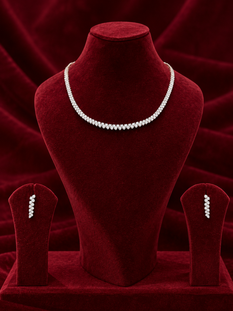 elegant diamond jewellery on burgundy velvet