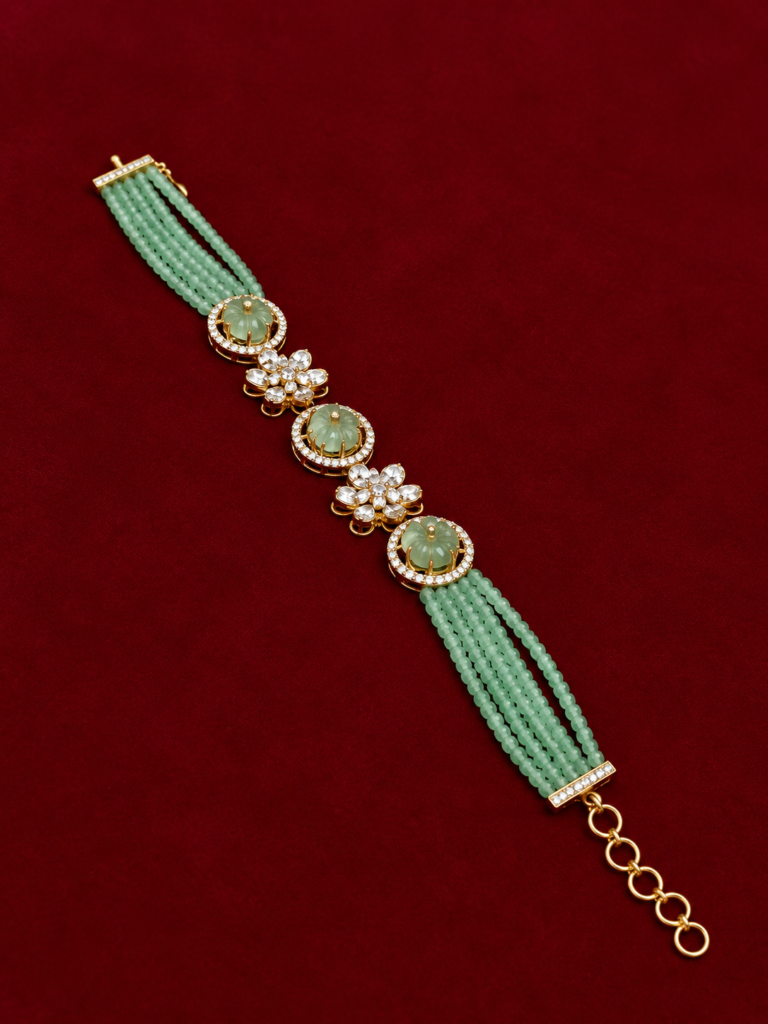 elegant green gemstone bracelet on burgundy (1)