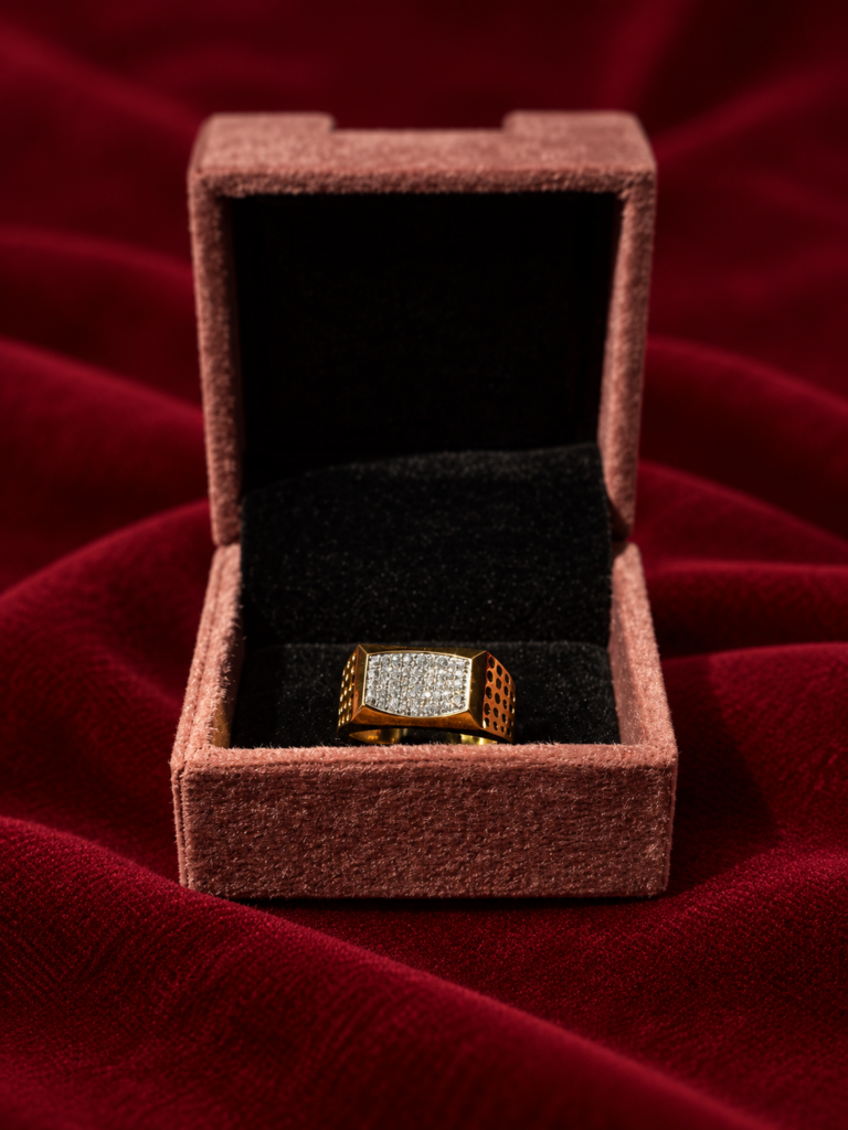 gold signet ring in velvet box